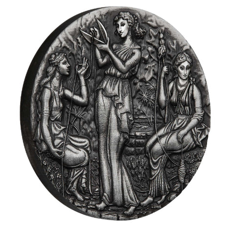 Decorative medallion with three figures in classical attire on a white background