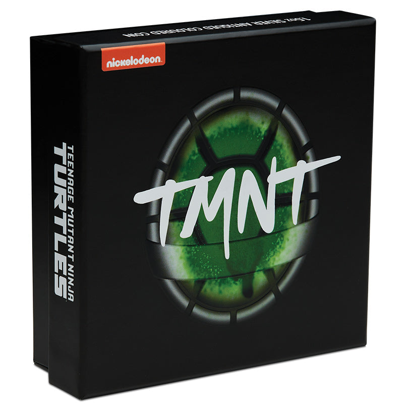 Black box with 'TMNT' logo featuring green and white text on a white background