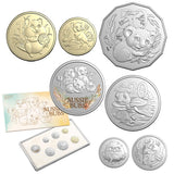 Collection of coins featuring koalas and other animals with a display card on a white background.