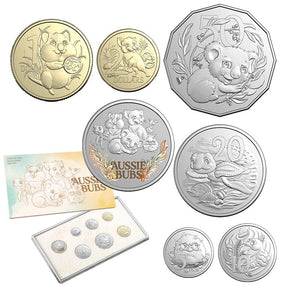 Collection of coins featuring koalas and other animals with a display card on a white background.
