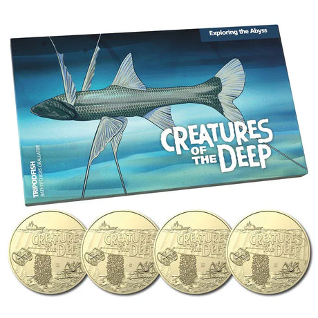 Set of 'Creatures of the Deep' coins with a packaging box featuring a fish illustration.